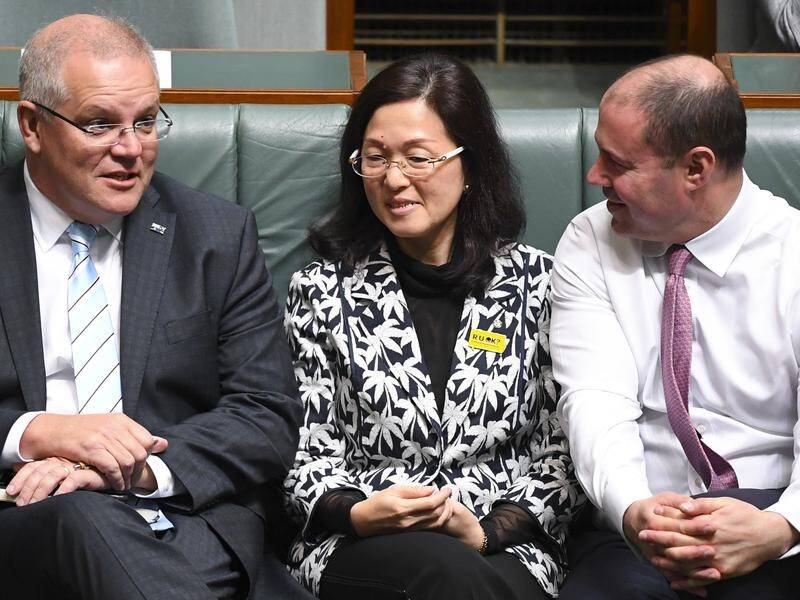 A legal challenge against the election of Gladys Liu (centre) and Josh Frydenberg (right) continues.