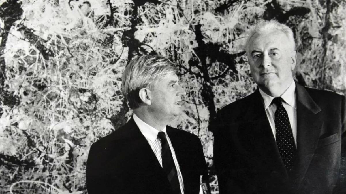 Former NGA director James Mollison and former prime minister Gough Whitlam in front of Blue poles in 1986. Picture Canberra Times