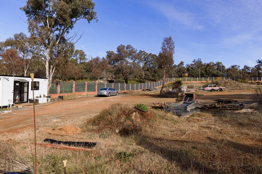 Construction materials lie unused on the Yarralumla site. Picture: Sitthixay Ditthavong