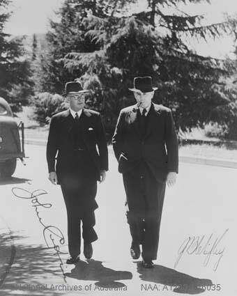 The iconic 1945 photo of Curtin and Chifley, right, on a walk they often took from Kurrajong Hotel to the Old Parliament House. Picture courtesy National Archives of Australia