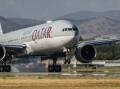 A Qatar Airways plane lands at Canberra Airport before the service was cut. Picture: Karleen Minney.