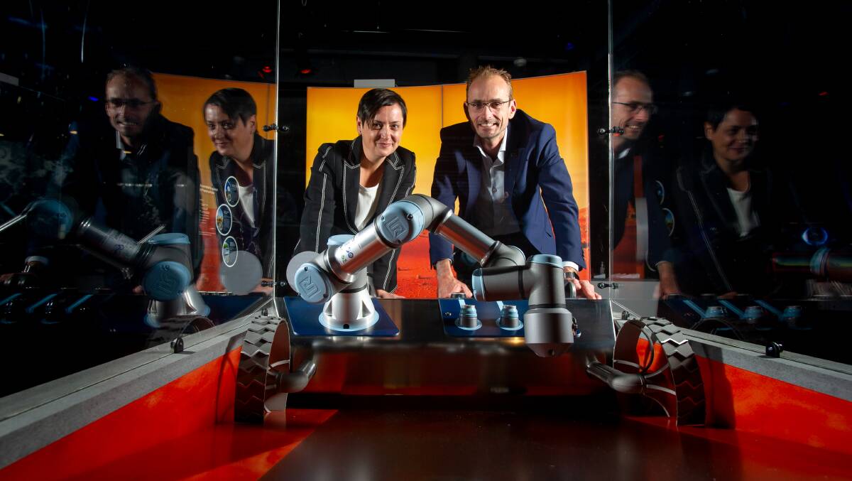 Dr Bobby Cerini (left) and Anthony Murfett with Mars rover simulation exhibit at the Australia in Space exhibition at Questacon. Picture: Elesa Kurtz