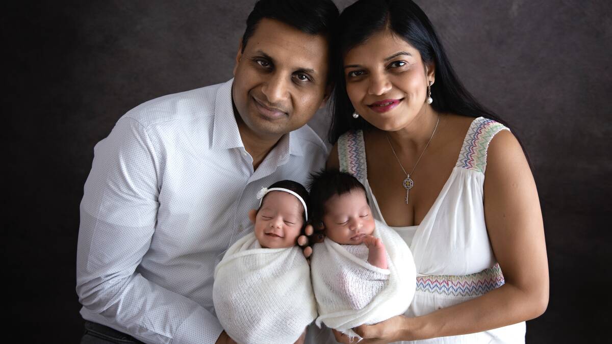 Front: Antara Jain (left) and Arjun Jain (born on August 13). Back: Dr Tarun Jain (left) and Dr Namita Mittal. Picture: ANU
