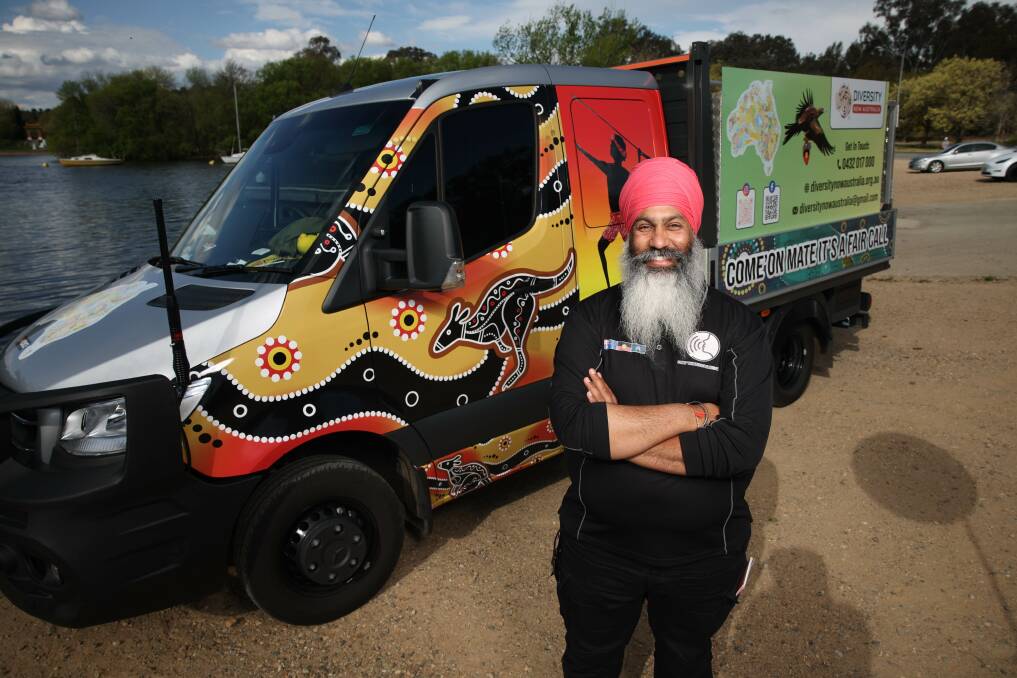 Amar Singh and his campaigning truck alongside Lake Burley Griffin. Picture by Gary Ramage