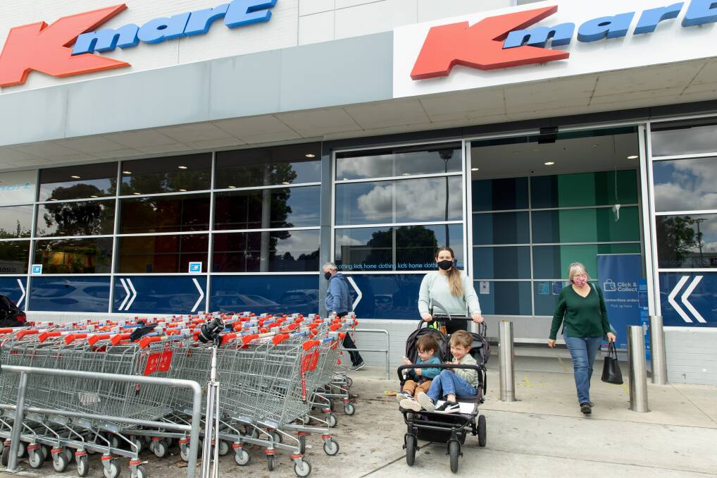 Sarah Kime and Charlie and Finn visited reopened Kmart. Picture: Sitthixay Ditthavong
