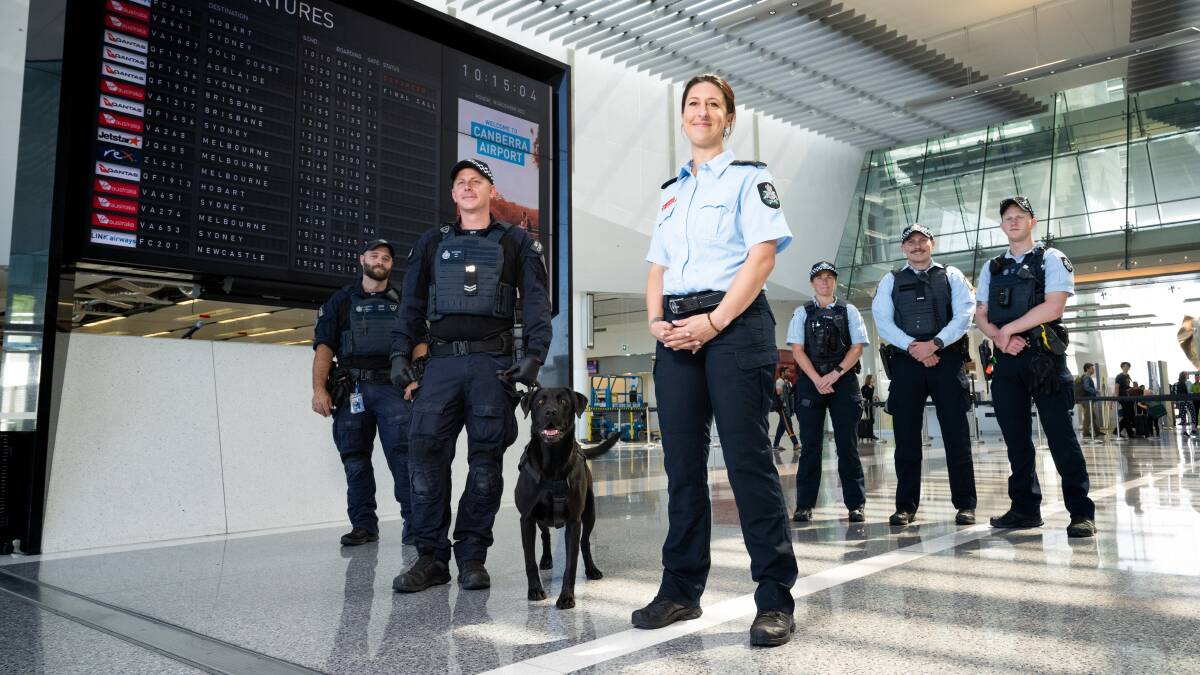 Aviation uniform police K9 unit: Justin Pritchard and Daniel Neit with explosive detection dog Krowbar, Detective acting inspector, Tanja Catalinac with senior constables Jodie Ingram and Edward Dudley and constable William Roberts. Picture by Elesa Kurtz