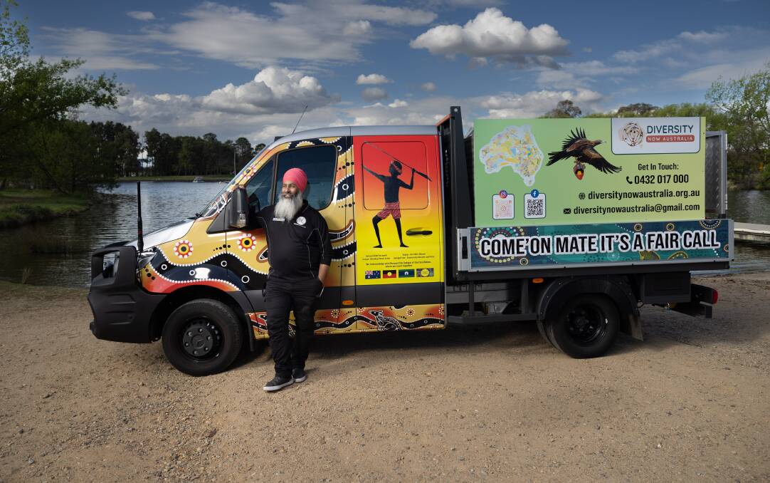Amar Singh and his campaigning truck alongside Lake Burley Griffin. Picture by Gary Ramage