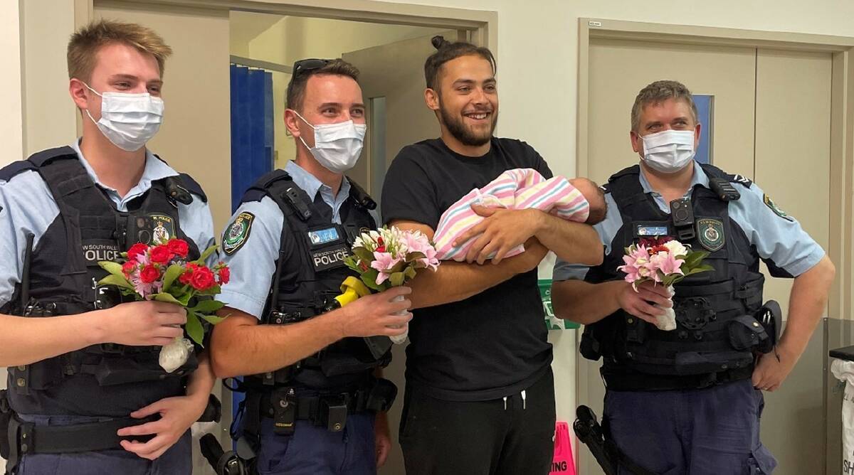 Officers distributed the flowers at Queanbeyan hospital. Picture Queanbeyan police via Facebook