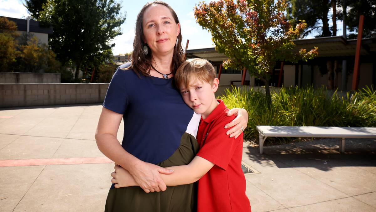 Kate Hamilton with her son Edwin outside Chapman Primary School. Picture: James Croucher