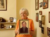 BEREFT: Audrey Nash, with a photo of her son, Andrew, who took his own life at their Hamilton home in 1974, aged 13, after being abused by convicted paedophile Vincent Ryan. Picture: Max Mason-Hubers