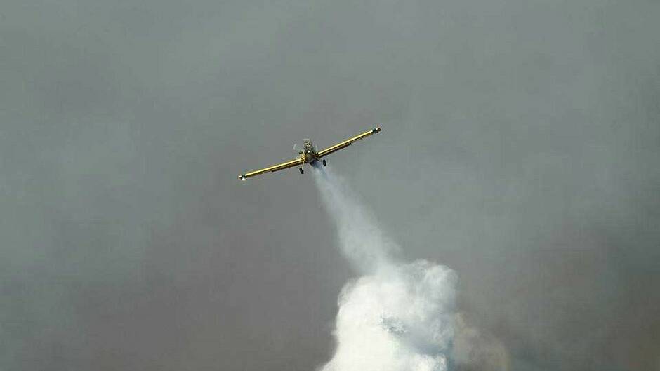 A bushfire burning out of control in the Perth hills has claimed one life and 44 homes. Pictures: DFES and Channel 10