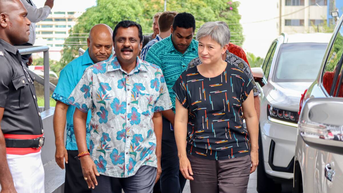 Australian Foreign Minister Penny Wong (right) arrives with Fiji Minister for Employment Praveen Bala, Picture: Getty Images
