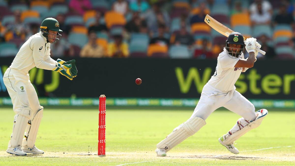 Cheteshwar Pujara of India bats as Tim Paine keeps wicket on the final day of the fourth Test at the Gabba. Picture: Getty Images