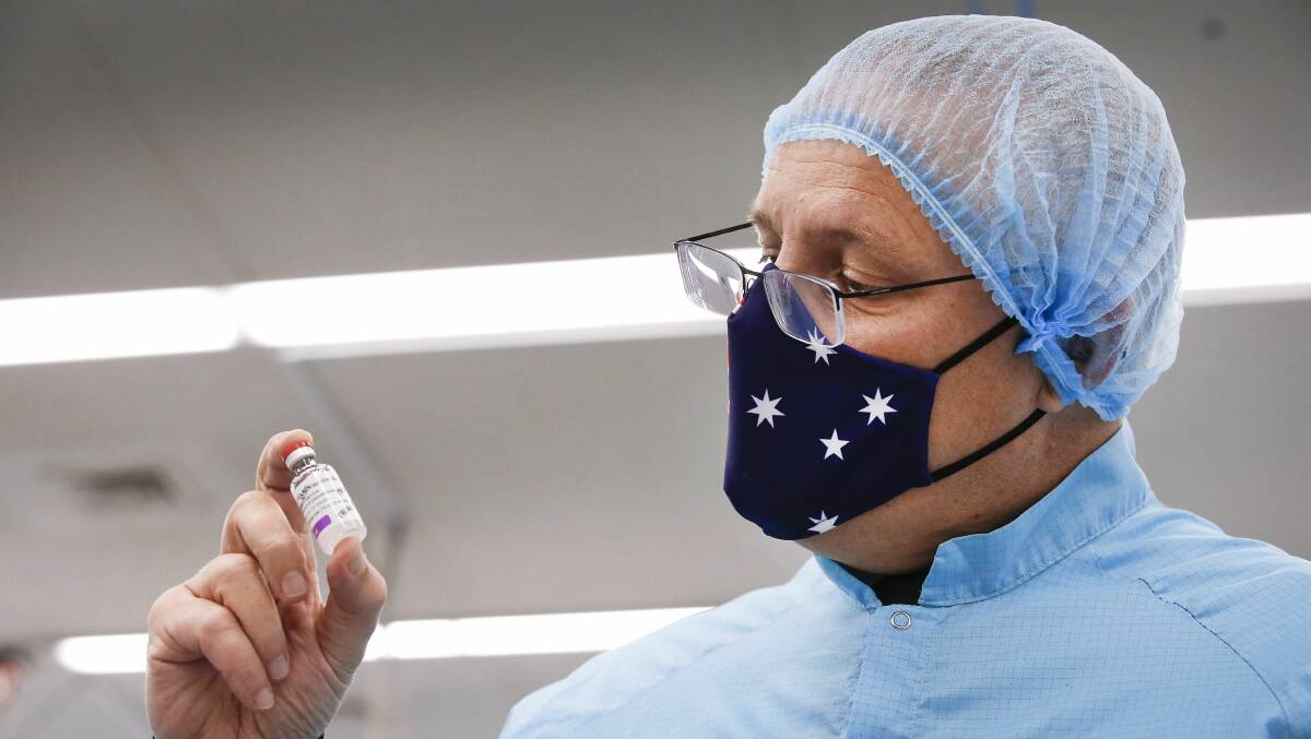 Prime Minister Scott Morrison with a vial of the AstraZeneca vaccine in February. Picture: Getty Images
