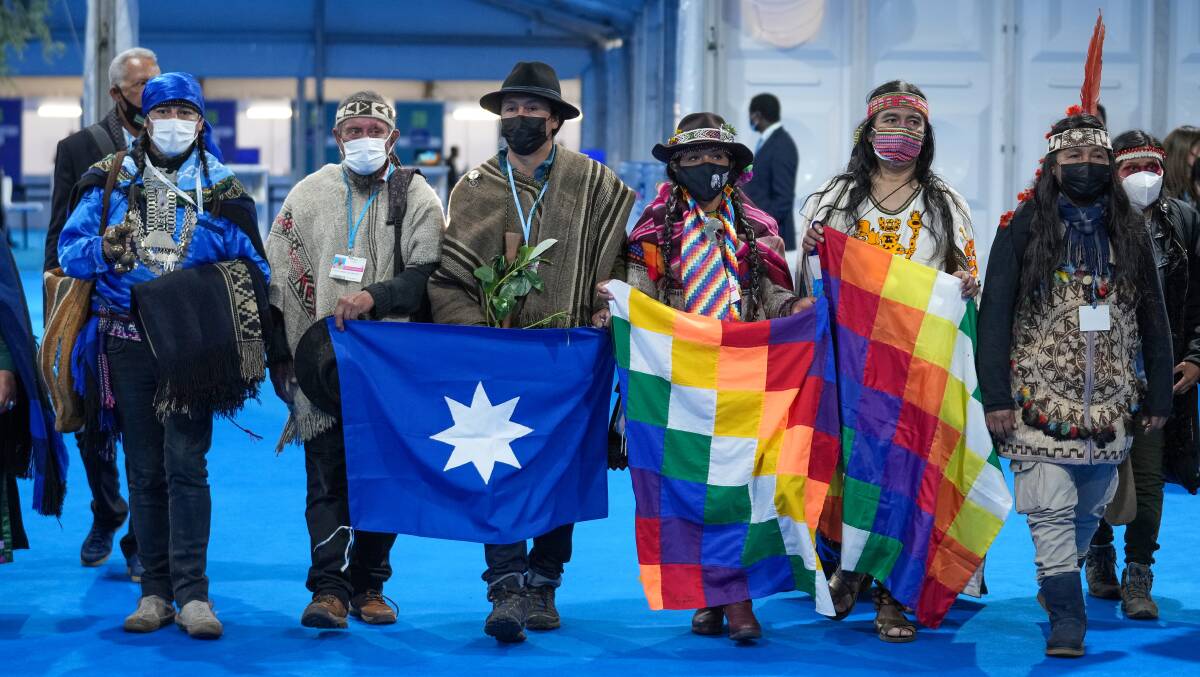 The Minga Indigena indigenous delegation arrives at COP26 on November 3. The grouping of collectives, organisations and communities from indigenous nations throughout the American continent delivered a letter to authorities in Glasgow. Picture: Getty Images