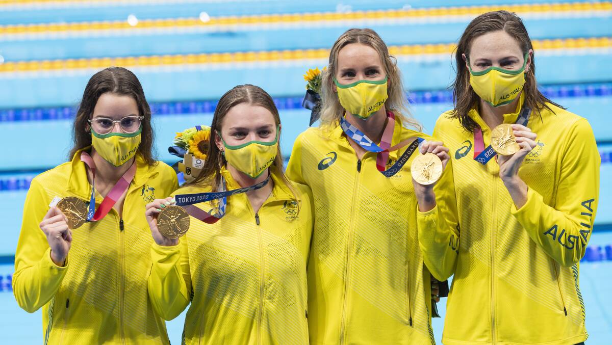 Kaylee McKeown, Chelsea Hodges, Emma McKeon and Cate Campbell show off their gold medals in the 4x100m medley relay. Picture: Insidefoto