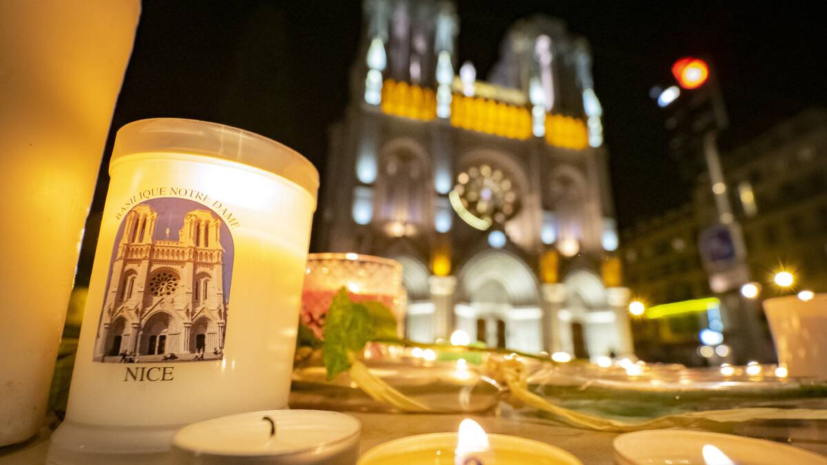 Tributes have been left in front of Notre-Dame Basilica after the latest terror attack. Picture: Getty Images