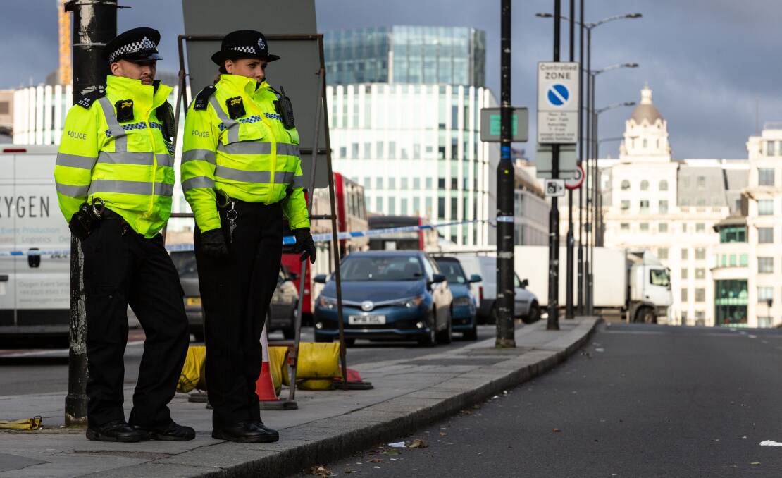 Police stand guard on London Bridge after the latest stabbing. Picture: Getty Images