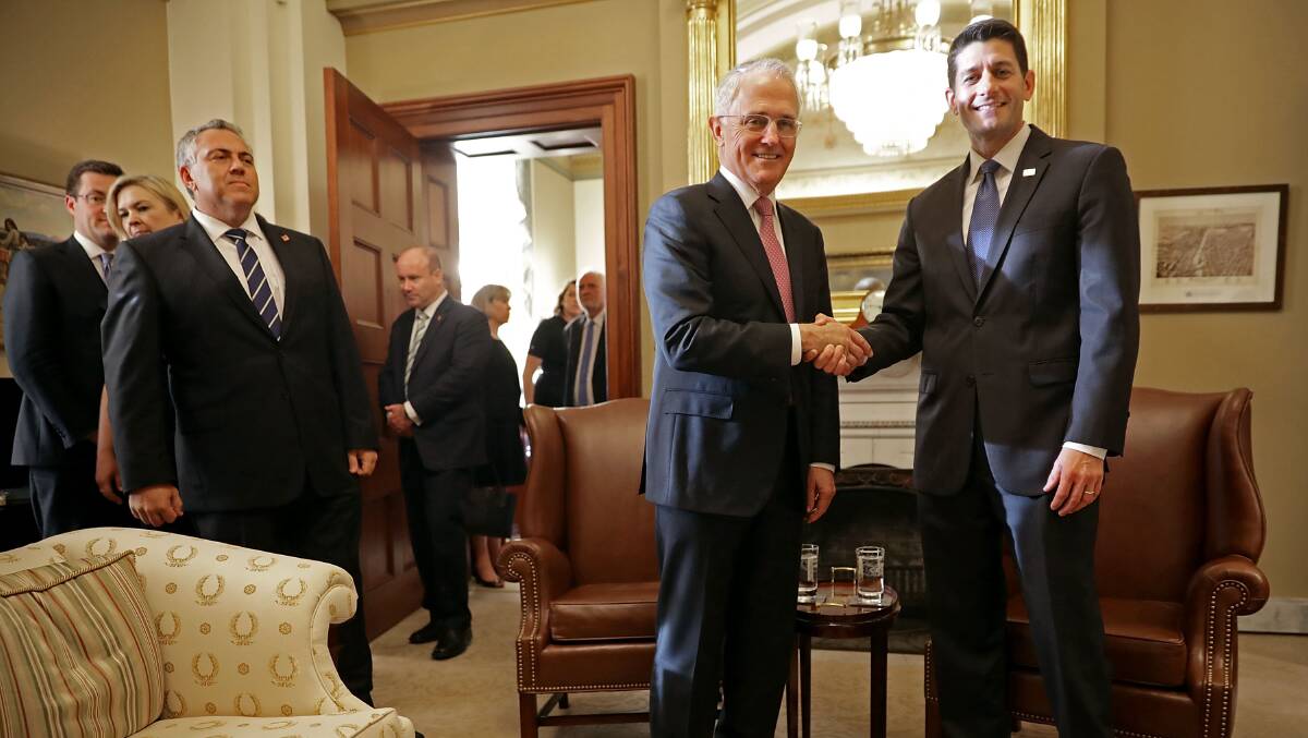 Australian ambassador to the US Joe Hockey (left) looks on as then Prime Minister Malcolm Turnbull (centre) and Speaker of the House Paul Ryan (right) pose for photographs at the US Capitol in 2016. Picture: Getty Images