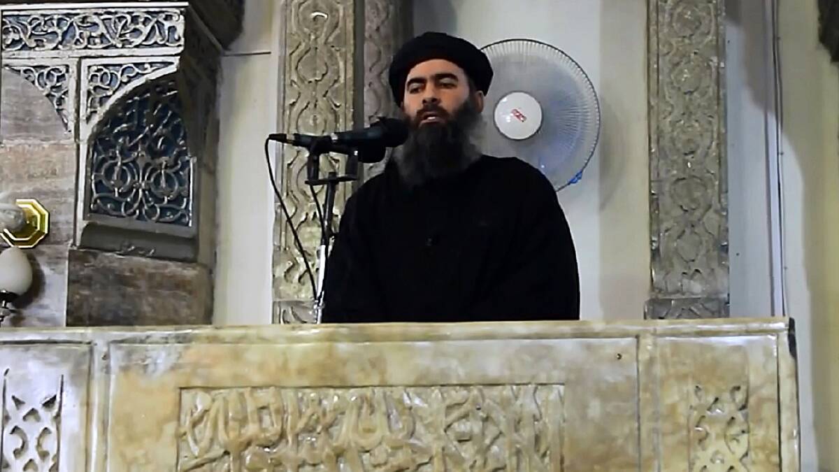 An image grab taken from a video released in 2014 shows alleged Islamic State leader Abu Bakr al-Baghdadi preaching at a mosque in Mosul. Picture: Getty Images