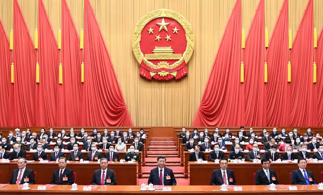 The fourth session of the 13th National People's Congress in Beijing on March 11. Chinese President Xi Jinping sits front and centre. Picture: Getty Images