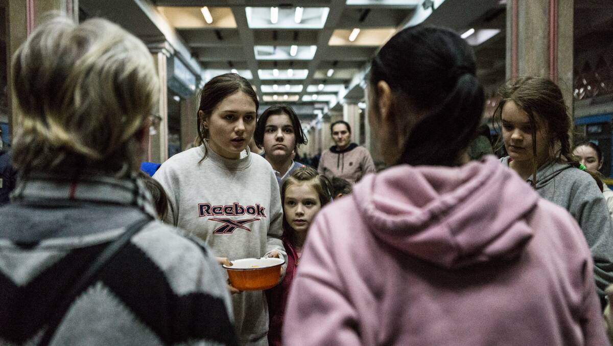 Ukrainian civilians take refuge at a metro station in Kharkiv, Ukraine on Thursday. Picture: Getty Images