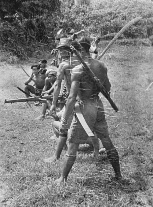 Iban warriors in training with Semut guerillas. Picture: National Archives of Australia