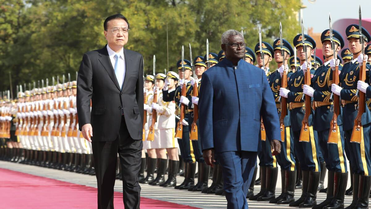 Chinese Premier Li Keqiang holds a welcoming ceremony in Beijing for Solomon Islands Prime Minister Manasseh Sogavare ahead of talks in 2019. Picture: Getty Images