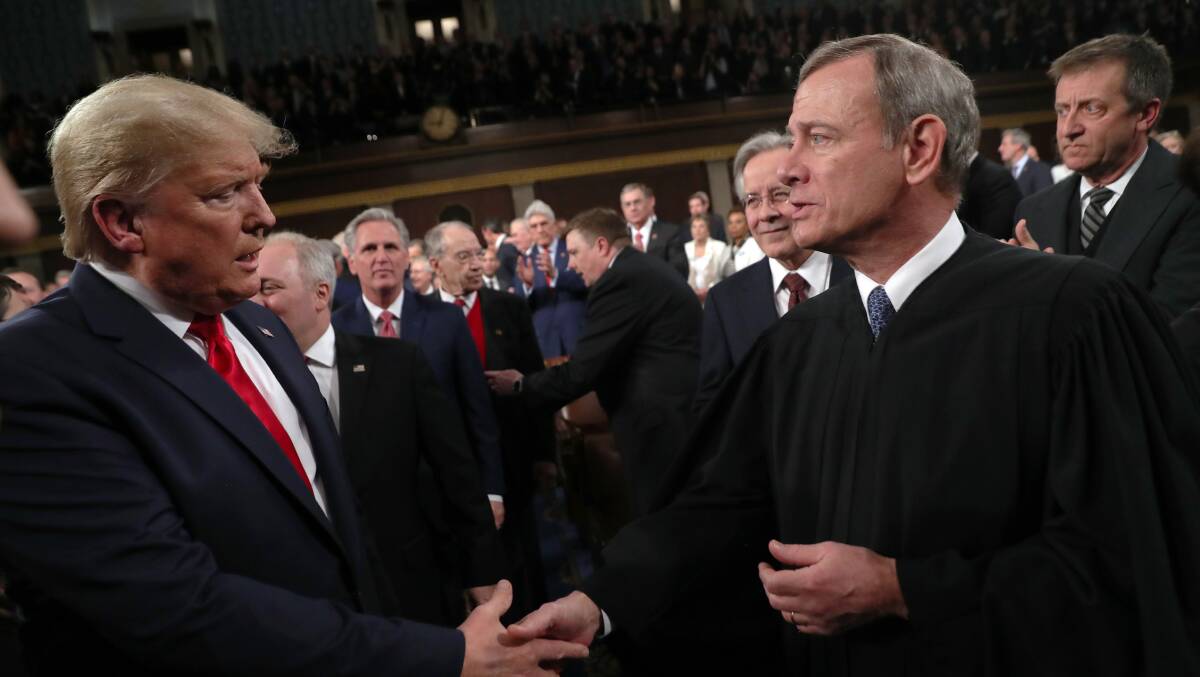 US President Donald Trump (left) and US Supreme Court Chief Justice John Roberts. Picture: Getty Images