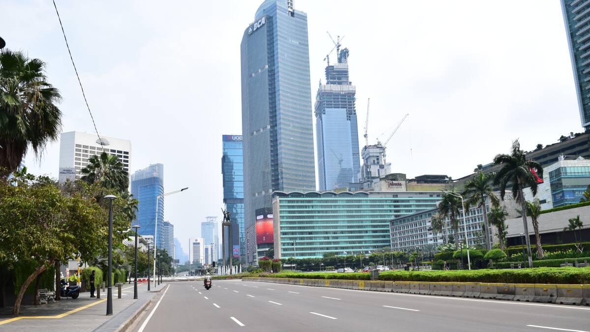 Many of Jakarta's usually bustling streets have gone quiet due to the spread of COVID-19. Picture: Shutterstock