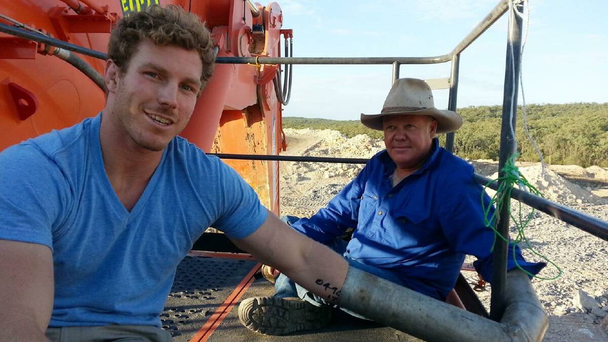 David Pocock and farmer Rick Laird locked on to excavation equipment in 2014. Picture: Twitter