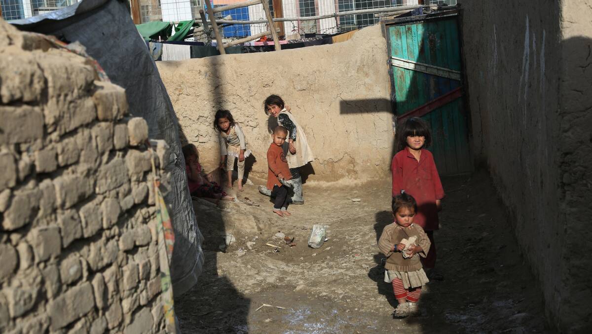 Displaced children play at a refugee camp in Kabul. Picture: Getty Images