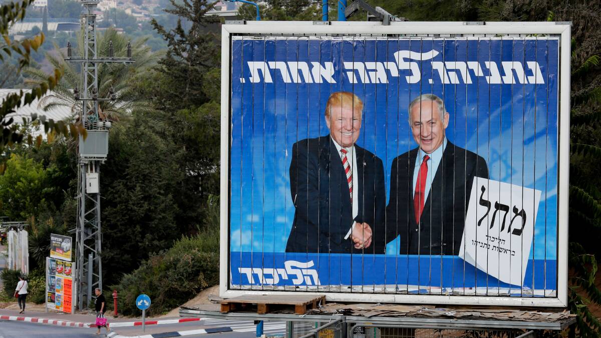 An Israeli election billboard for the Likud party showing US President Donald Trump shaking hands with Israeli PM Benjamin Netanyahu. Picture: Shutterstock