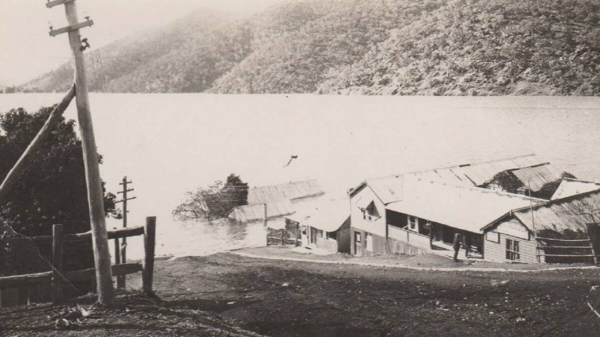 A rising Burrinjuck Dam in 1922 starts to submerge part of old Barren Jack City. Picture: Yass and District Historical Society Inc