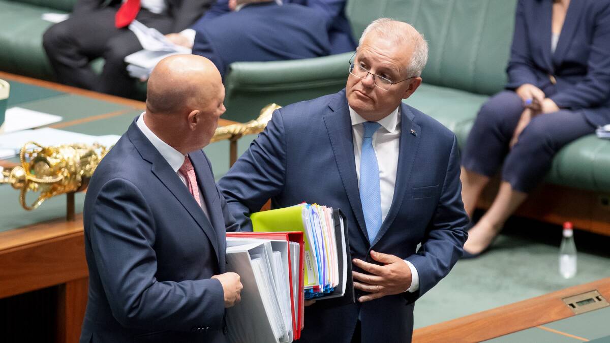 Dutton and Morrison couldn't be happier when Labor is the target of progressive activists' ire on asylum seekers. Picture: Sitthixay Ditthavong