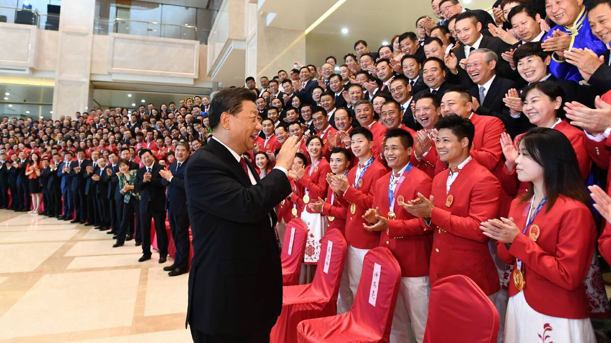 Chinese President Xi Jinping meets with members of China's sporting community, including athletes and coaches from the Tokyo 2020 Olympics, in September. Picture: Xinhua News Agency via Getty Images