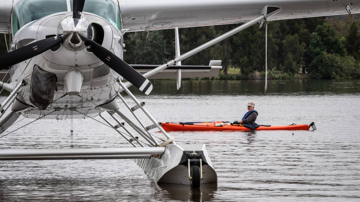 The Alt Air seaplane touches down on Lake Burley Griffin for the first time. Picture: Karleen Minney
