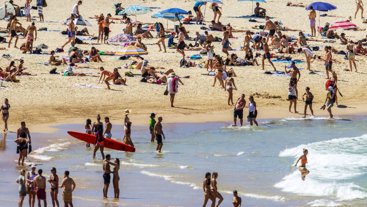 Crowds were still gathering at Bondi Beach in Sydney just late last month. Picture: Getty Images