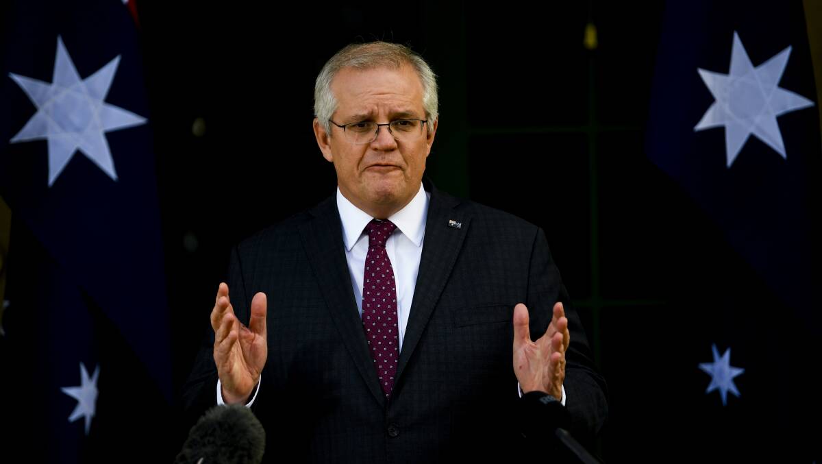 Scott Morrison has issued an apology for the coronavirus vaccine rollout missing key targets. Picture: AAP