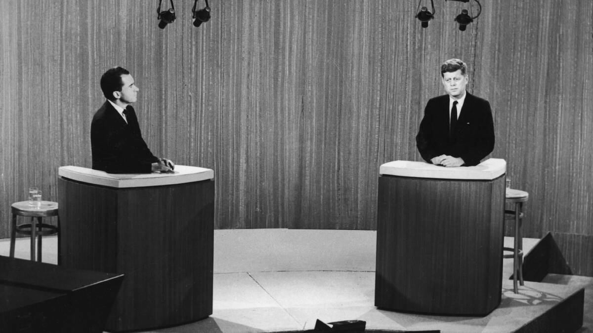 Then-Vice-President Richard Nixon and Democratic Senator John F. Kennedy during a televised debate in 1960. Picture: Getty Images