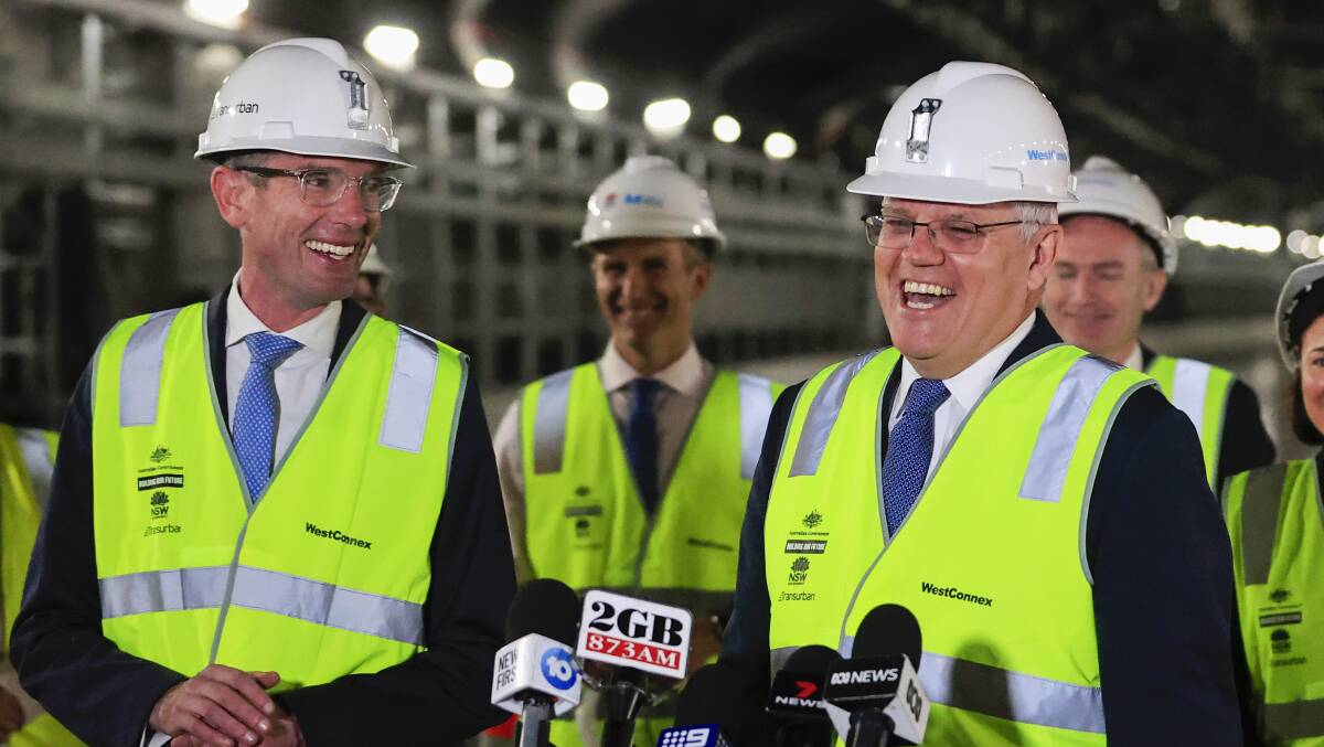 Prime Minister Scott Morrison (right) and NSW Premier Dominic Perrottet. Picture: Getty Images
