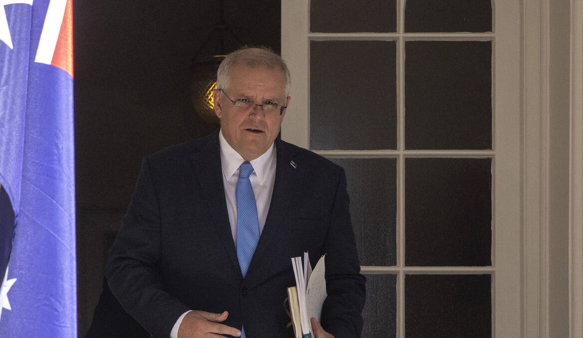 Prime Minister Scott Morrison arrives at a press conference at Kirribilli House after the release of the aged care royal commission report. Picture: Getty Images