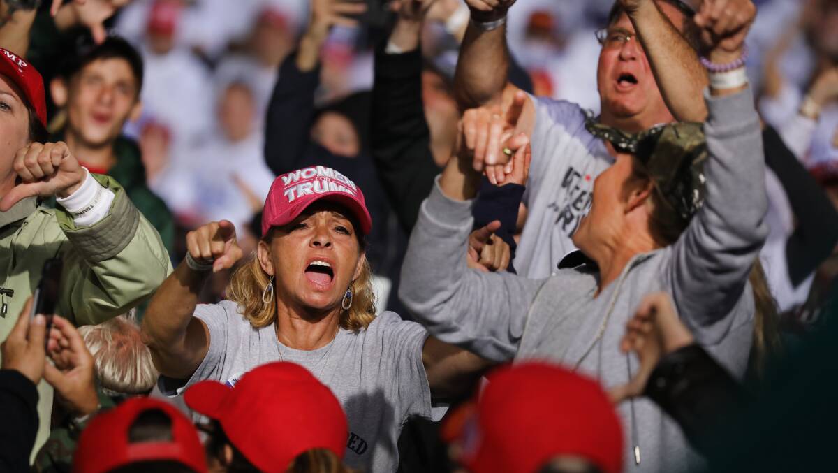 Supporters jeer at the media as President Trump speaks at a rally in Pennsylvania on September 26. Picture: Getty Images