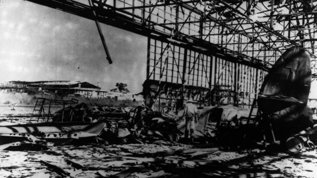 An American Hudson bomber lies in the ruins of a hangar destroyed during the Japanese bombing raid on Darwin Harbour in 1942. Picture: Getty Images