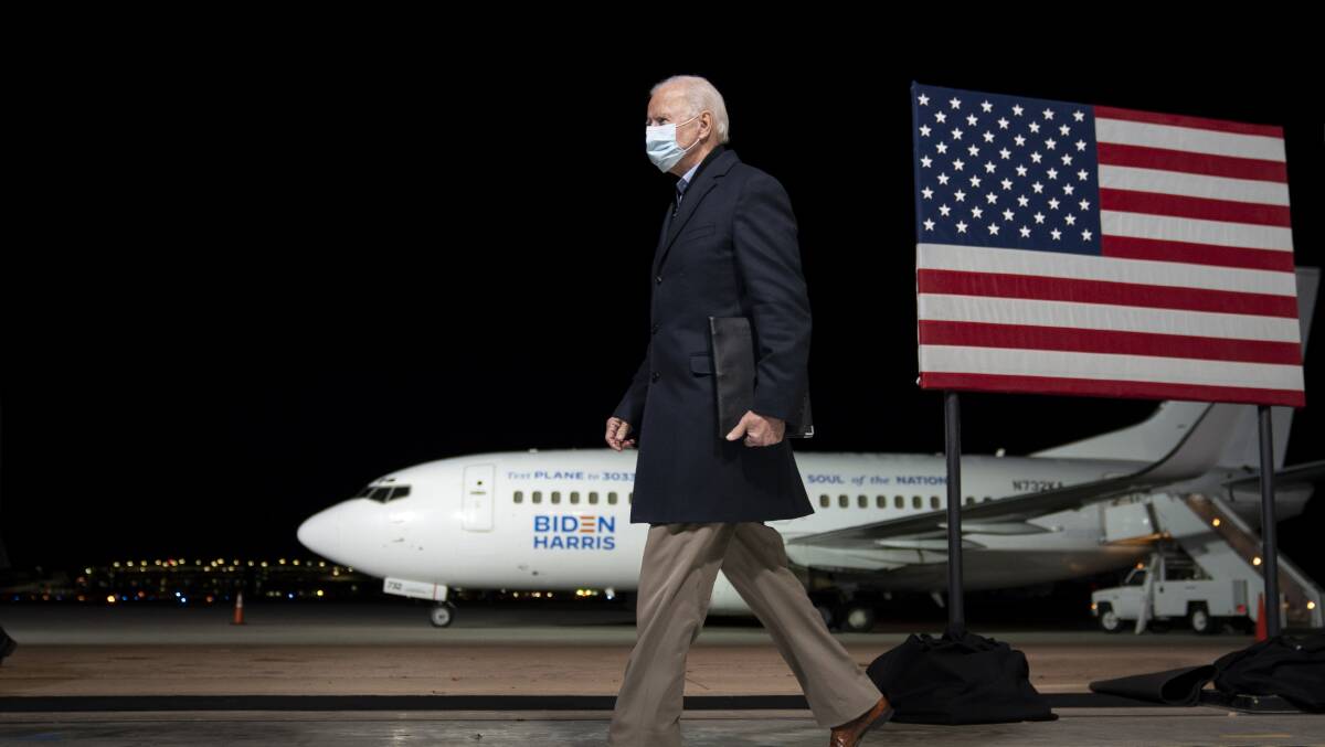Democratic presidential nominee Joe Biden departs after speaking at Milwaukee Mitchell International Airport on Friday. Picture: Getty Images