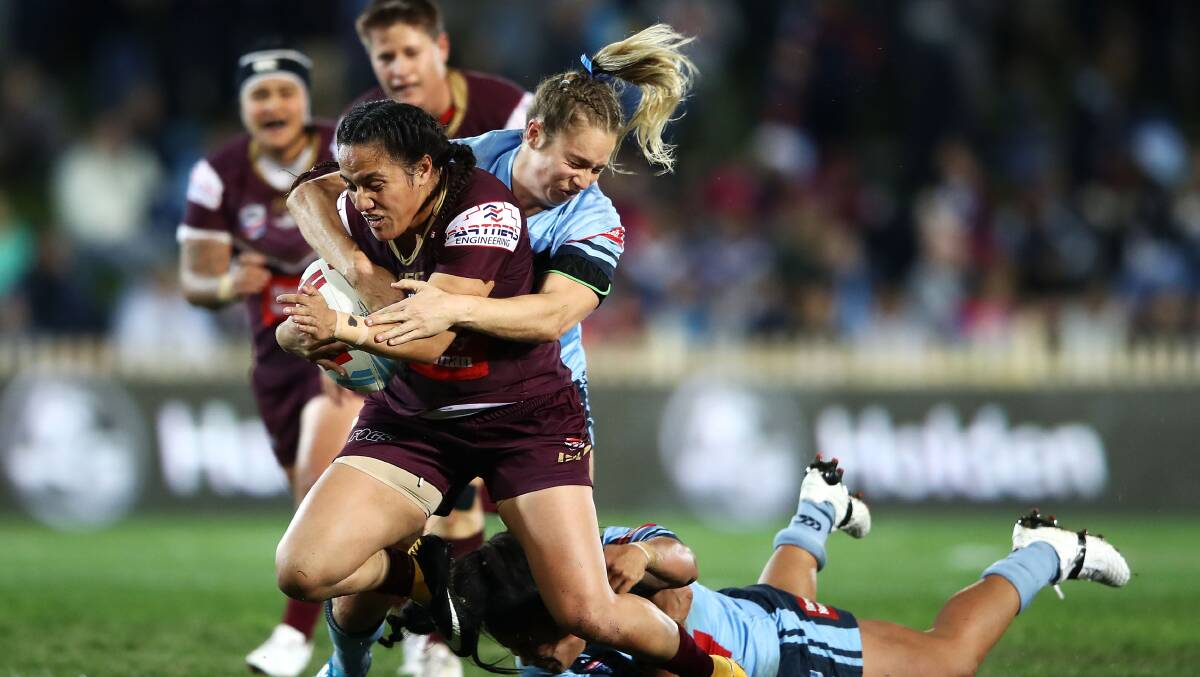 Tazmin Gray (pictured playing for Queensland) will run out on grand-final day before brother and Canberra Raider Jordan Rapana. Picture: Getty Images