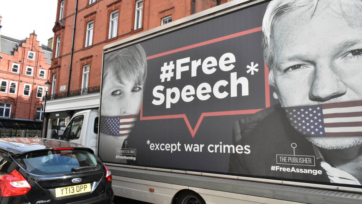 A mobile billboard in London draws attention to the persecution of Chelsea Manning and Julian Assange. Picture: Shutterstock
