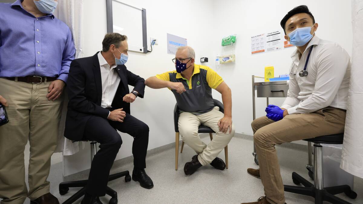 Health Minister Greg Hunt (left) and Prime Minister Scott Morrison after Mr Morrison received his first COVID-19 vaccination in February. Picture: Getty Images