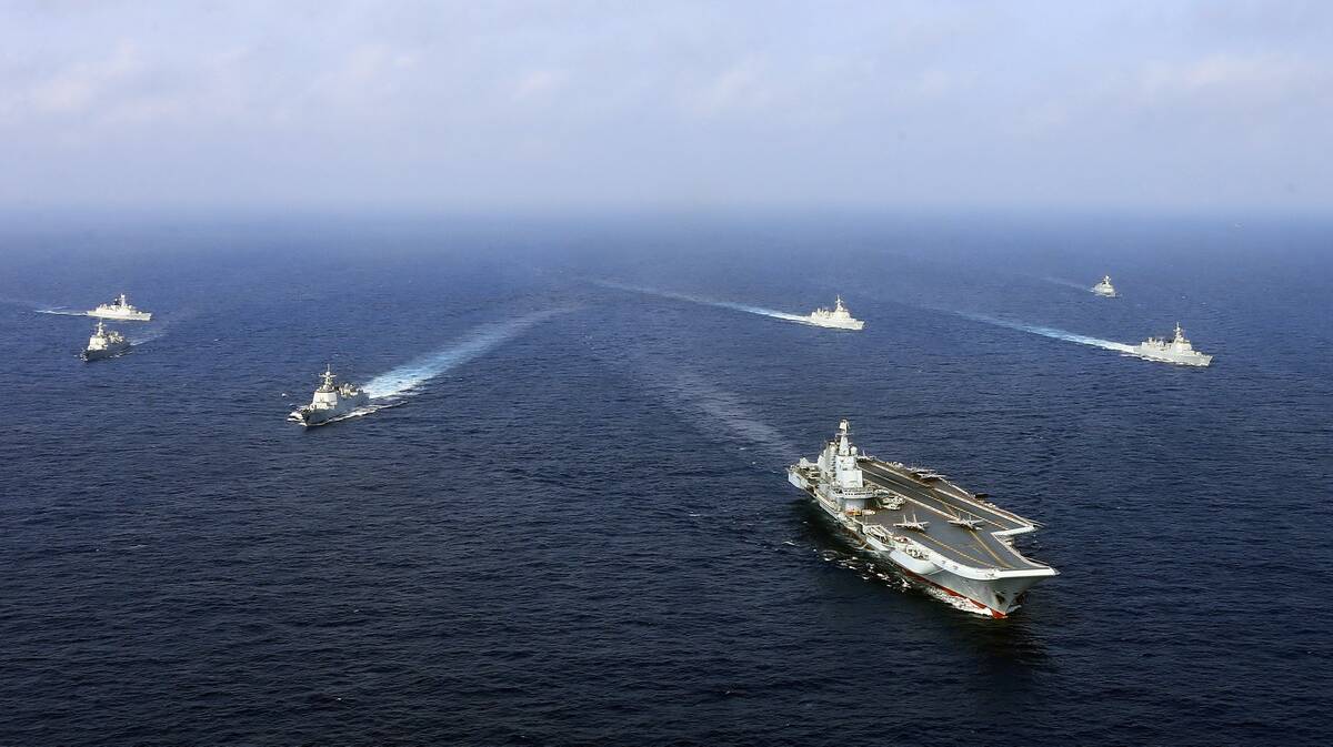 A People's Liberation Army navy fleet including the aircraft carrier Liaoning. Picture: Getty Images