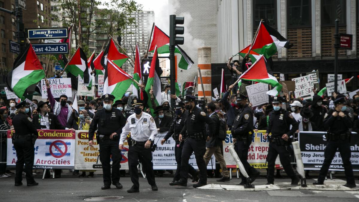 Pro-Palestinian demonstrators take part in a protest near the Israeli consulate in midtown Manhattan. Picture: Getty Images